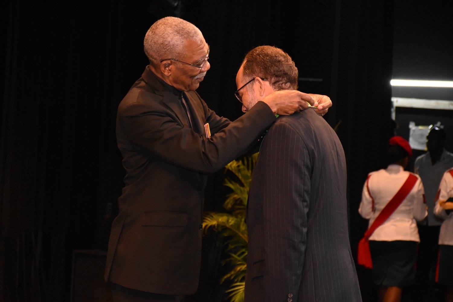 President of Guyana, His Excellency David Granger bestows the Cacique's Crown of Honour on CARICOM Secretary-General, Ambassador Irwin LaRocque at the National Cultural Centre, Georgetown, Guyana, 6 October, 2017.