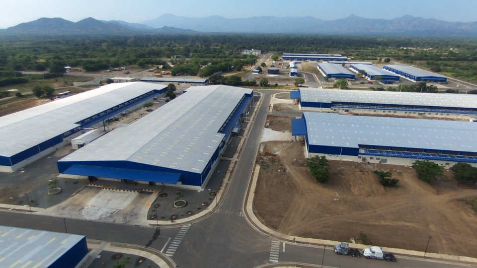 An aerial view of the Caracol INdustrial Park's Fleet of buses fr employees and adminisrative building taken in Haiti in April. The park employs 6,200 Haitians in northern Haiti. Courtesy of the Inter-Ameican Development Bank