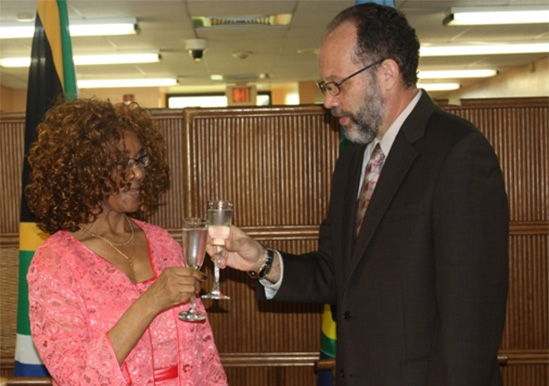 Newly accredited Ambassador of South Africa to CARICOM, Her Excellency Maureen Modiselle, and Ambassador Irwin LaRocque, CARICOM Secretary-General raise a toast for continued good relations between the two parties.