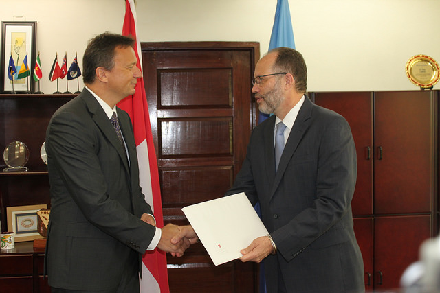 Amb. Mr. LaRocque (r) receives the Letters of Credence from H.E. Mr. Chasot