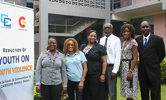 Programme Manager for Sustainable Development at the CARICOM Secretariat Ms. Beverly Reynolds (second right in front row) and Representative from the Government of Spain Mr. Gary Da Silva (front right) pose for a photo with stake holders from the par