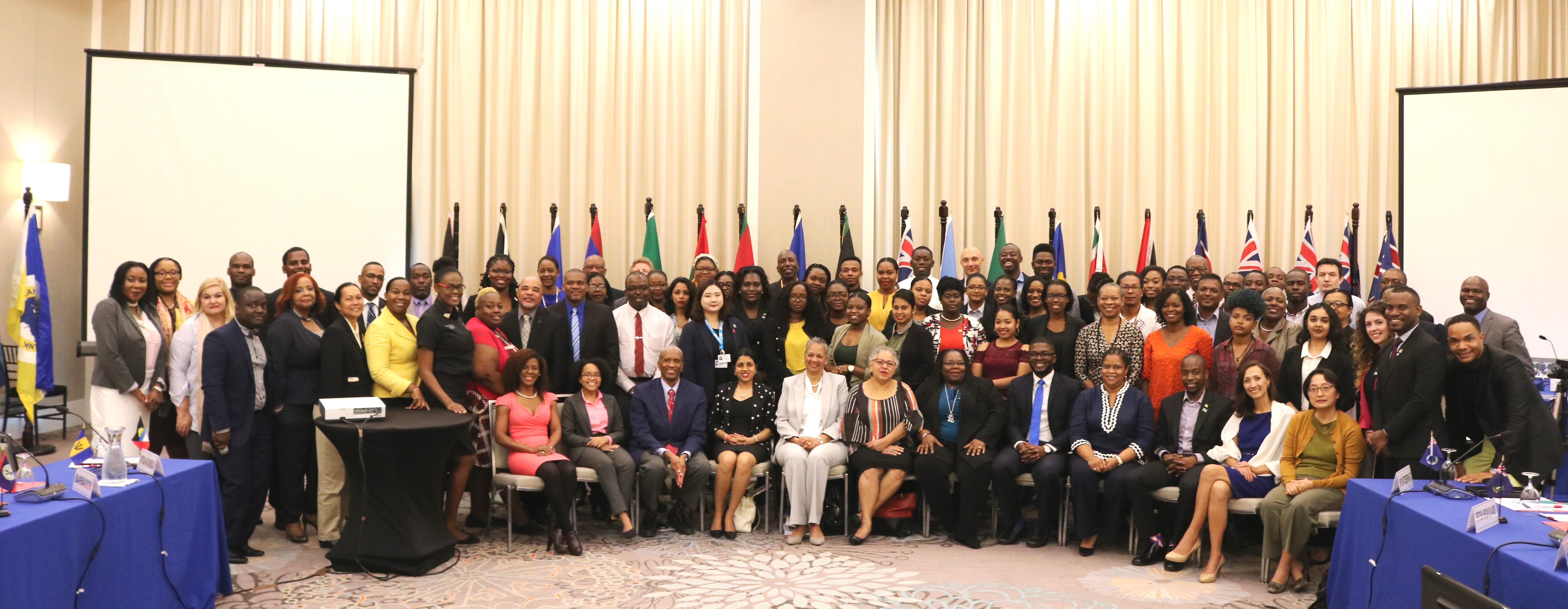 A group photo following the opening of the Caribbean Forum on Youth Population and Development
