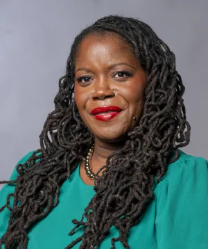 H.E. Dr. Mutryce Williams