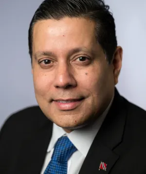 H.E. Dr. Neil Parsan